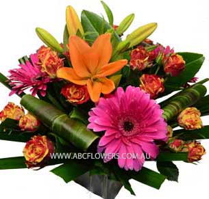 A041 Hawthorn a beautiful flower arrangement with pink gerberas orange lilies and colourful roses